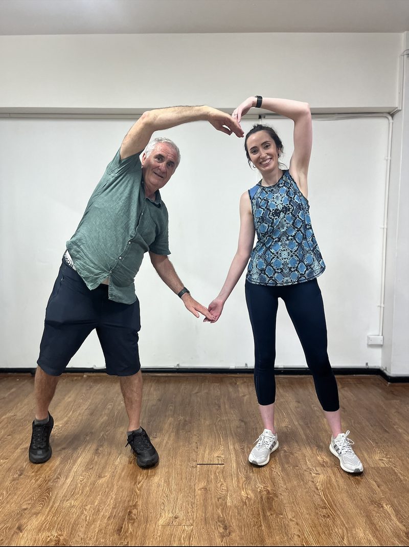 A couple in a first-dance lesson in the studio