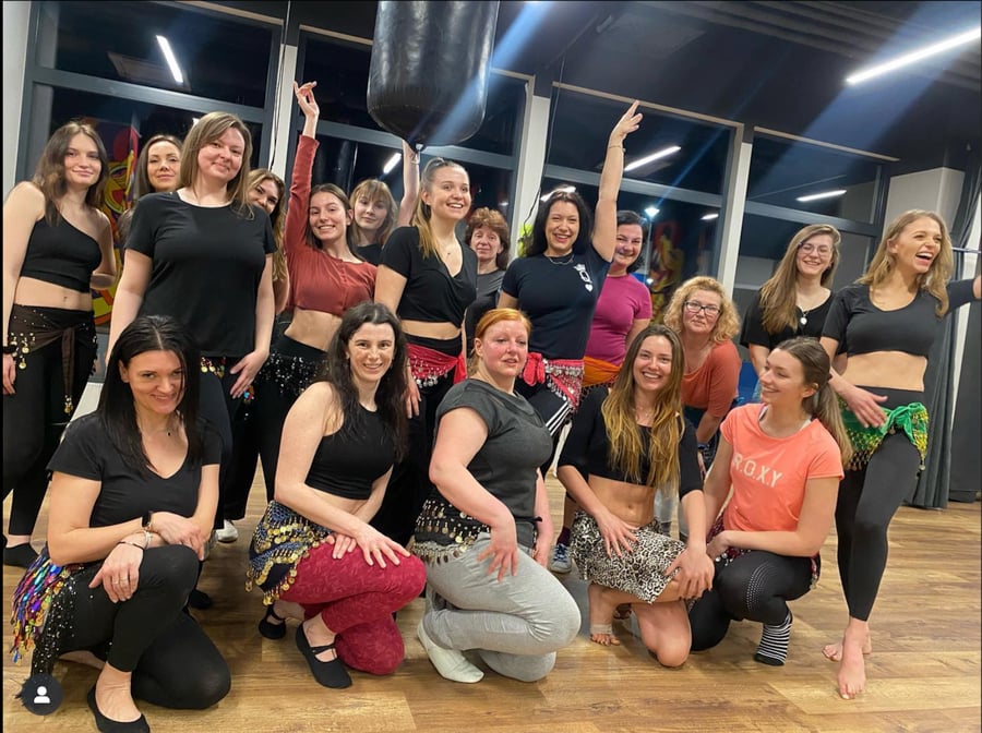 Aleksandra's students smiling together after class